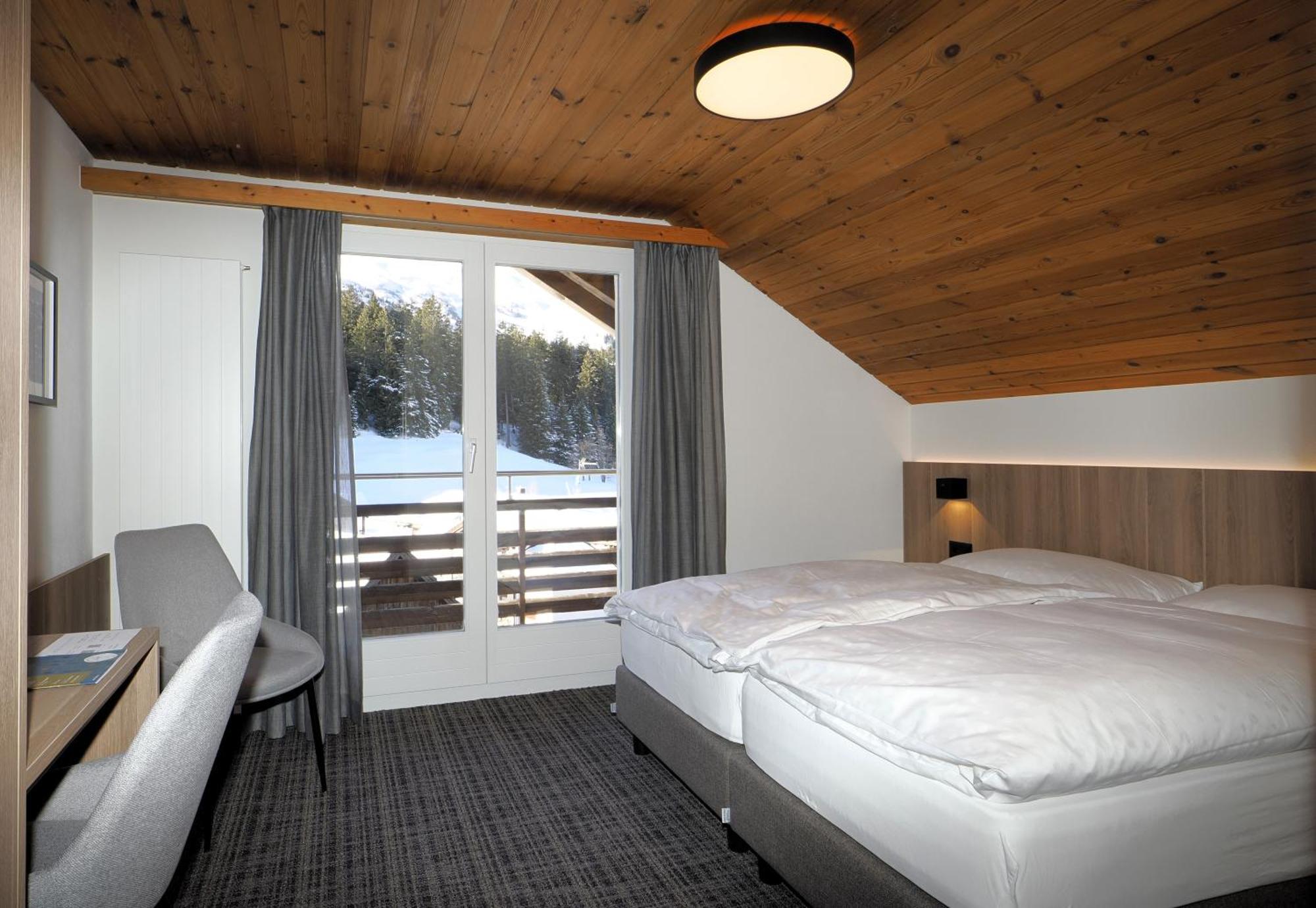 Hotel Alpina Parpan Bagian luar foto